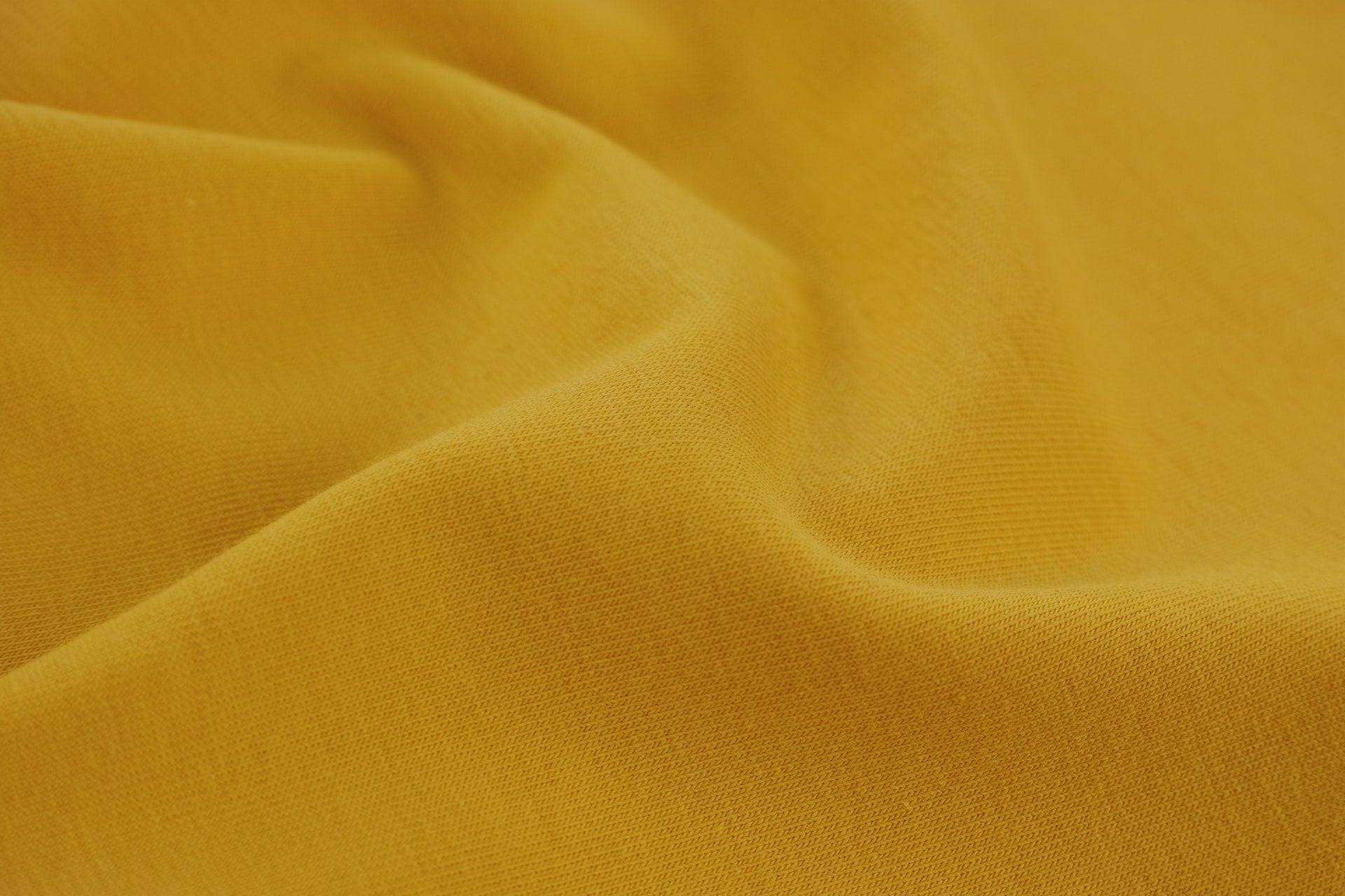 Yellow light textile. Photo by engin akyurt on Unsplash